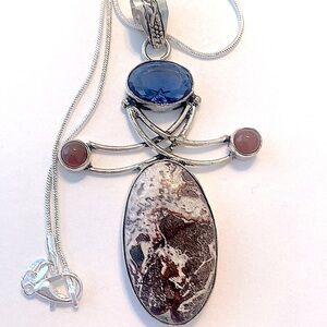 2 inch, 925 marked, Crazy Laze Agate, BlueTopaz and Carnelian. On a silver chain